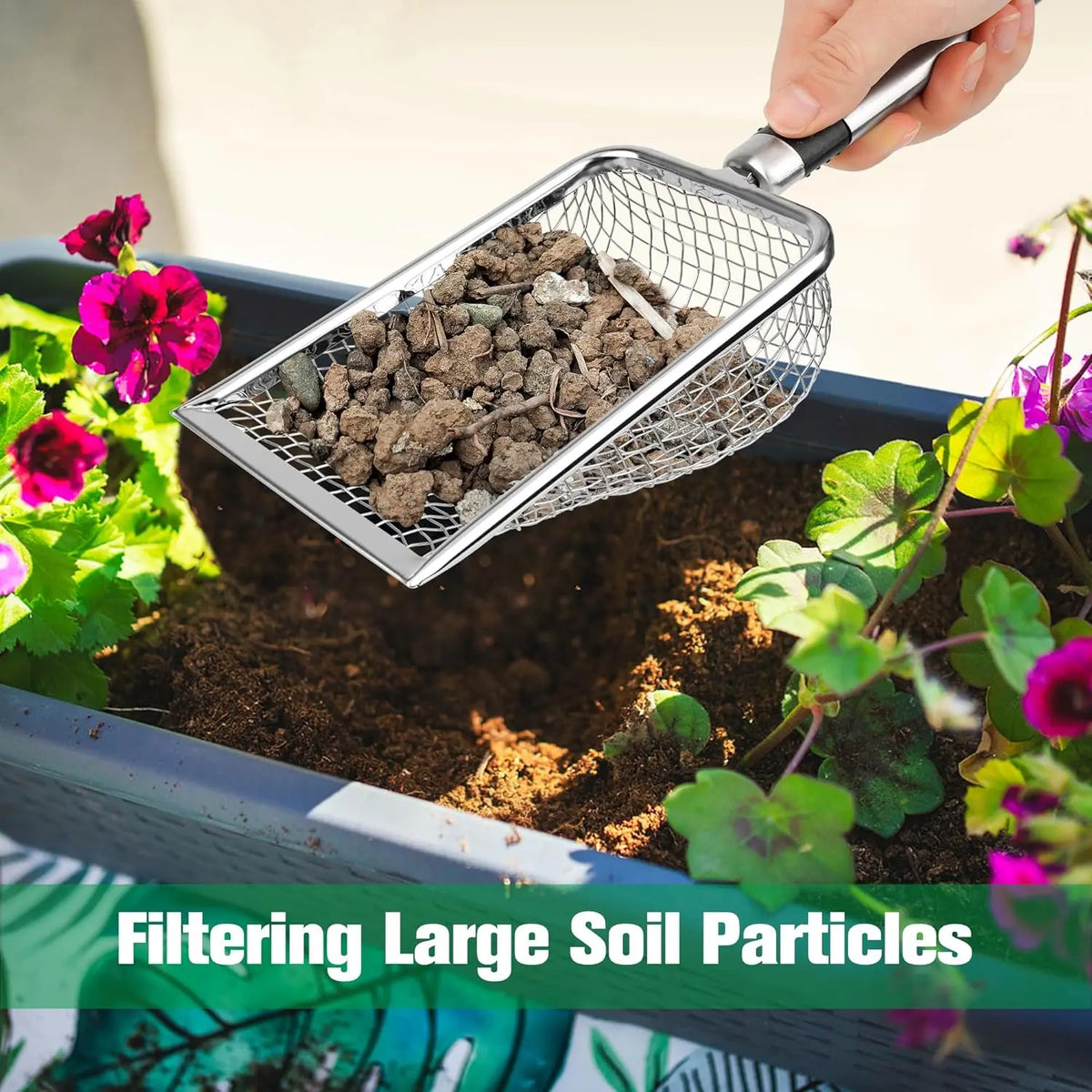 A hand is using a stainless steel mesh sieve to filter large soil particles into a plant pot.