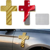 Three 3D USA flag cross emblems in gold, red, and silver mounted on a car surface.