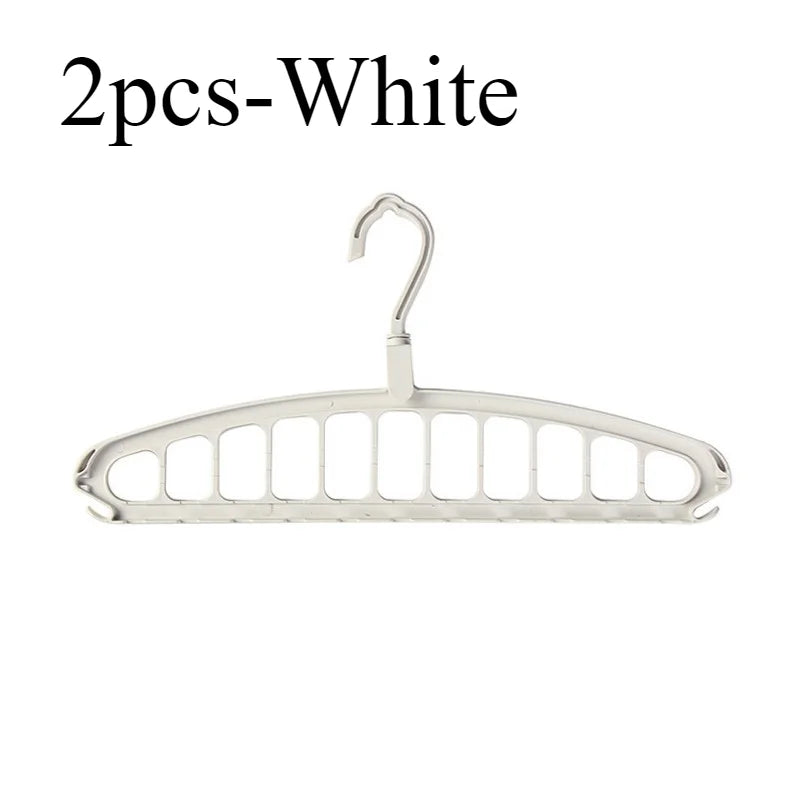 A white foldable multi-hole space-saving clothes hanger with a curved hook.