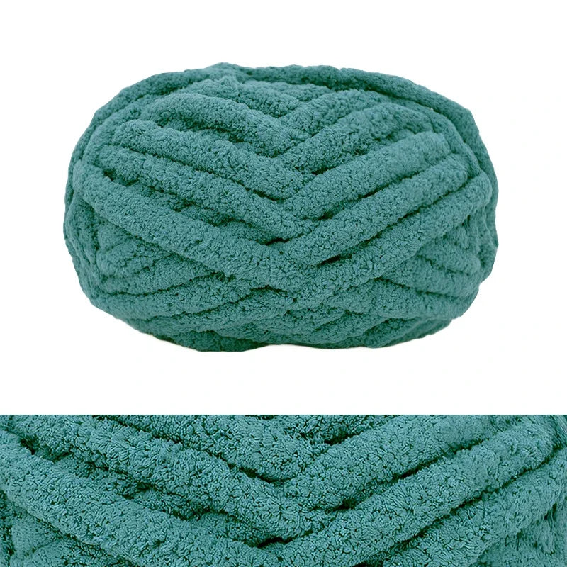 A ball of teal chunky chenille yarn with a ribbed texture.