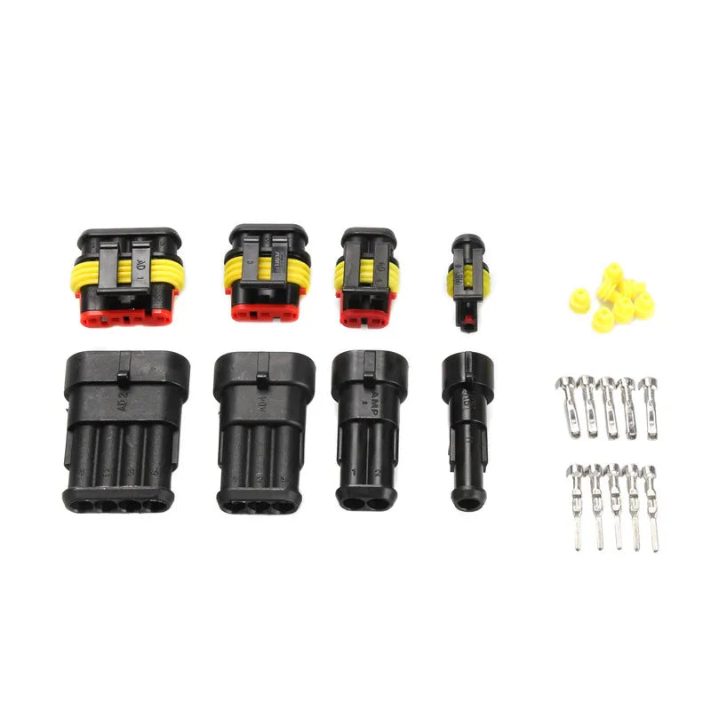 A set of waterproof automotive electrical connectors including male and female terminals and associated wires.