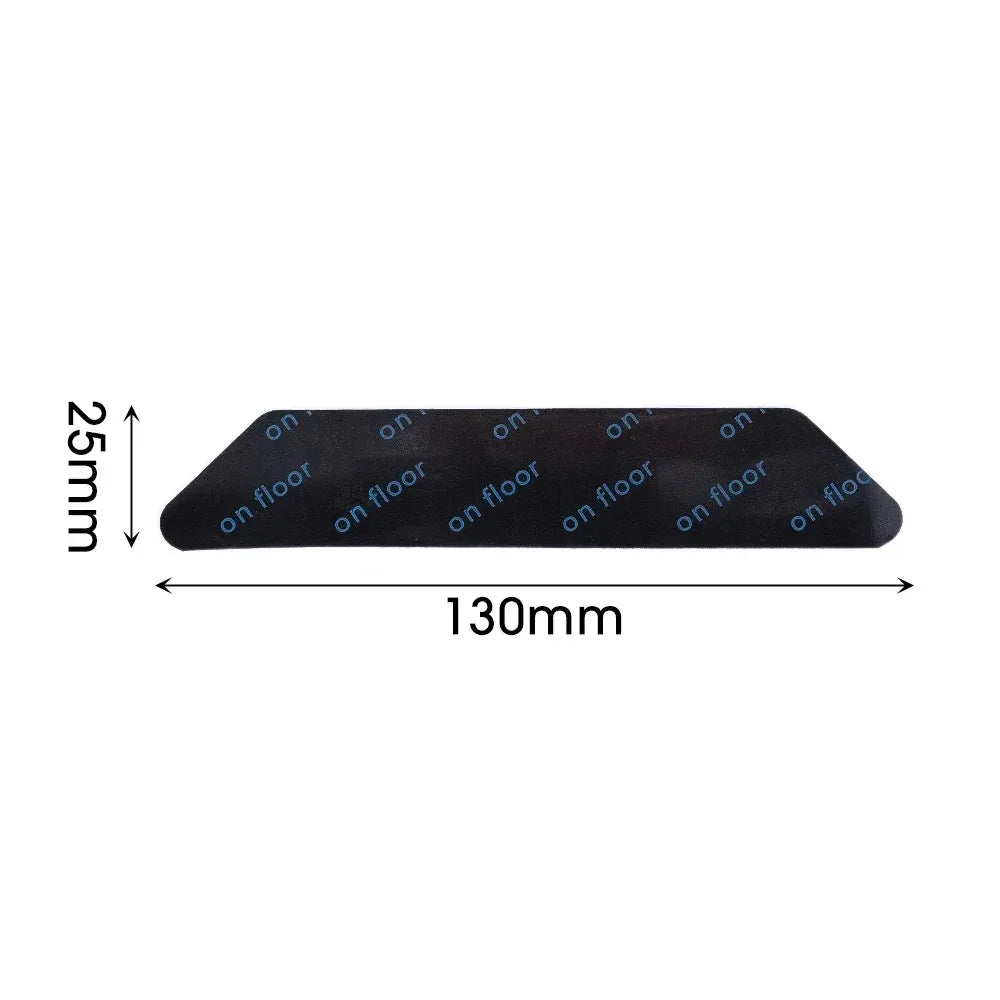 A black, rectangular non-slip rug gripper with a 25mm height and 130mm length, showing multiple 'on floor' markings.
