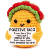 Handmade crochet taco doll with a positive message card that says I may be a tiny taco but I believe in you