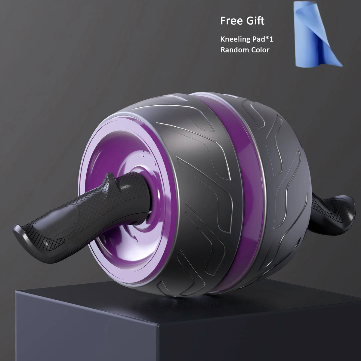 A gray and purple spring-loaded ab roller is shown on a dark surface with a blue kneeling pad included as a free gift.