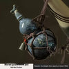 Moran gourd wine pot a dark blue ceramic bottle with a metal bell attached and a net bag