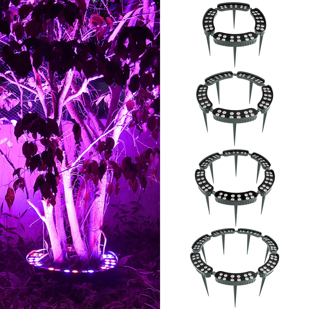 A tree is illuminated by purple LED lights, with a ground spike light visible at the base.