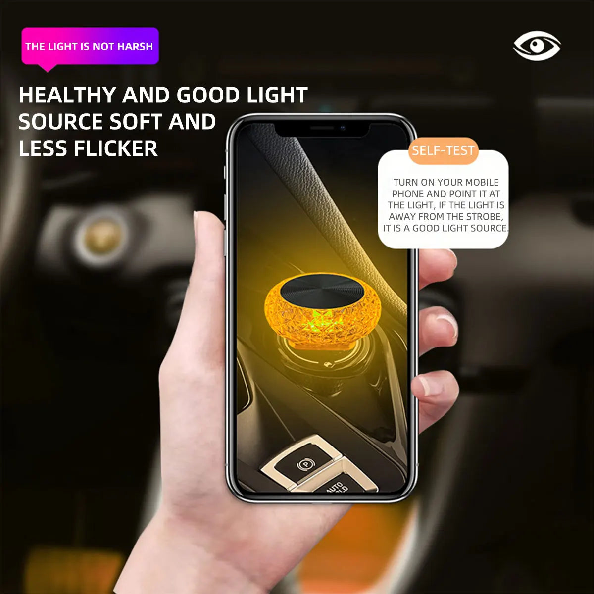 A hand holds a smartphone displaying an orange ambient light source used for car interior or PC lighting.