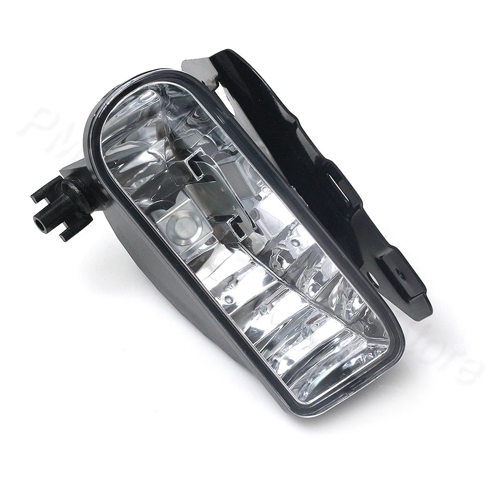 Black front fog light assembly for Cadillac Escalade, showing clear bulbs and housing.