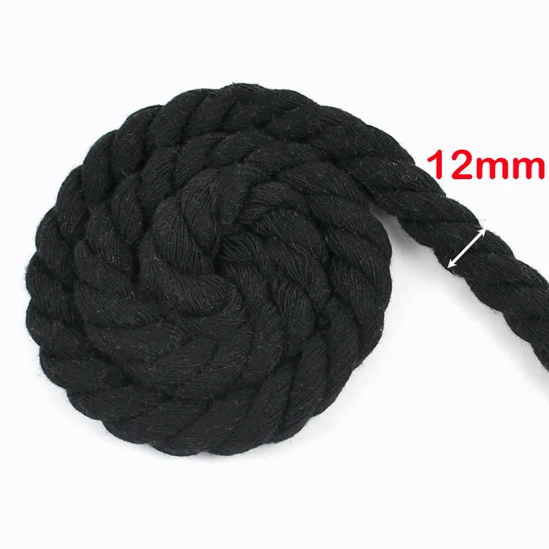 A ball of black natural twisted cotton cord with a 12mm thickness.