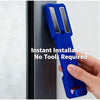 A hand holds a blue magnetic wall-mounted spray can organizer designed for instant installation without tools.