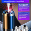 Diffuseur d'arômes USB portable avec LED et deux flacons d'huile essentielle sur une surface sombre.