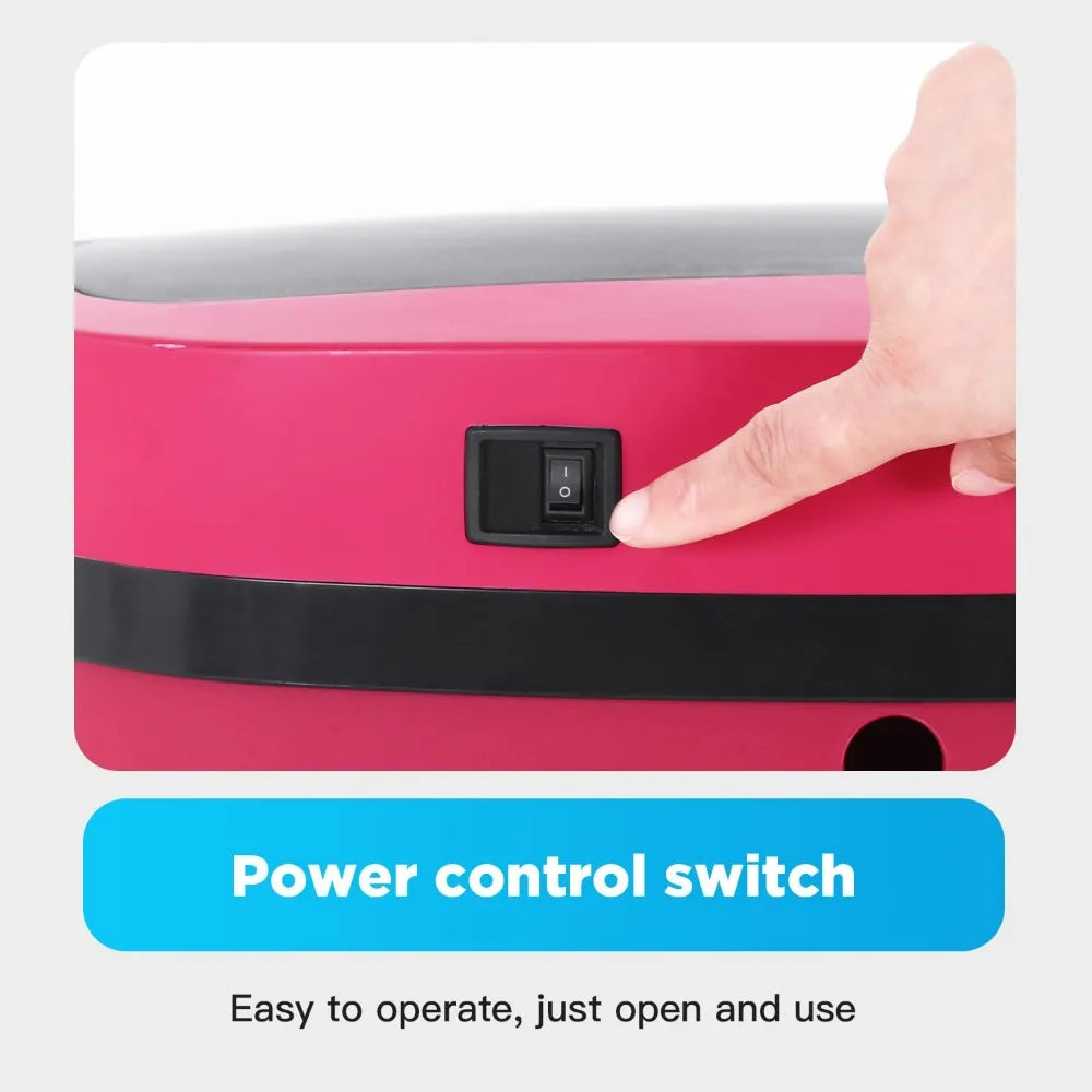 A hand is operating the power control switch on a pink automatic touchless trash can.