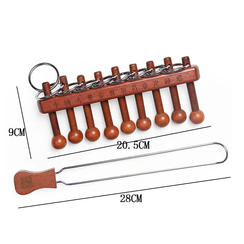 A set of wooden and metal wire puzzle brain teasers with a chain and a long wire tool.
