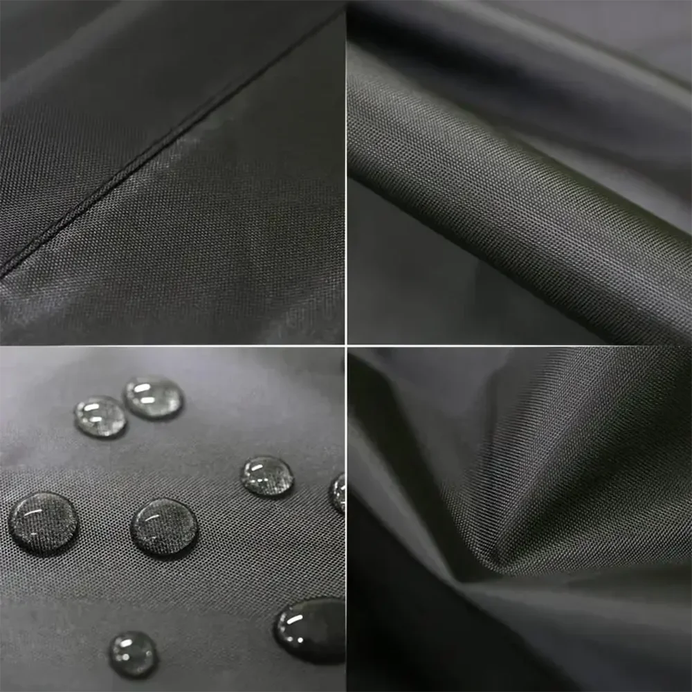 Close-up view of black waterproof outdoor furniture cover fabric showing texture and small silver buttons