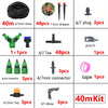 A collection of various drip irrigation components including hoses, plugs, connectors, and drippers.