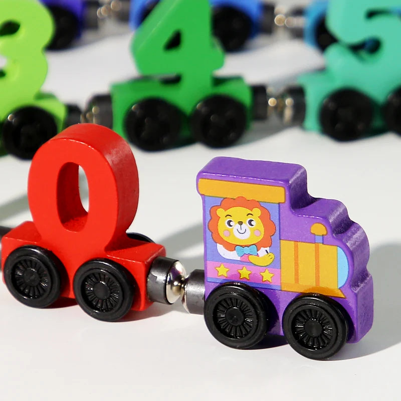 A red magnetic wooden number train set featuring the number zero and a colorful train engine.