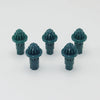 A set of five green replacement drivers for a battling top, used for fixing or adjusting the mechanism.
