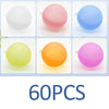 A collection of 60 reusable splash water balloons in various colors including white, pink, blue, yellow, and orange.