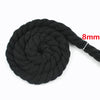 A ball of black natural twisted cotton cord with an 8mm thickness.