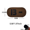 A brown glow-in-the-dark blood type tactical patch with a hook and loop backing.
