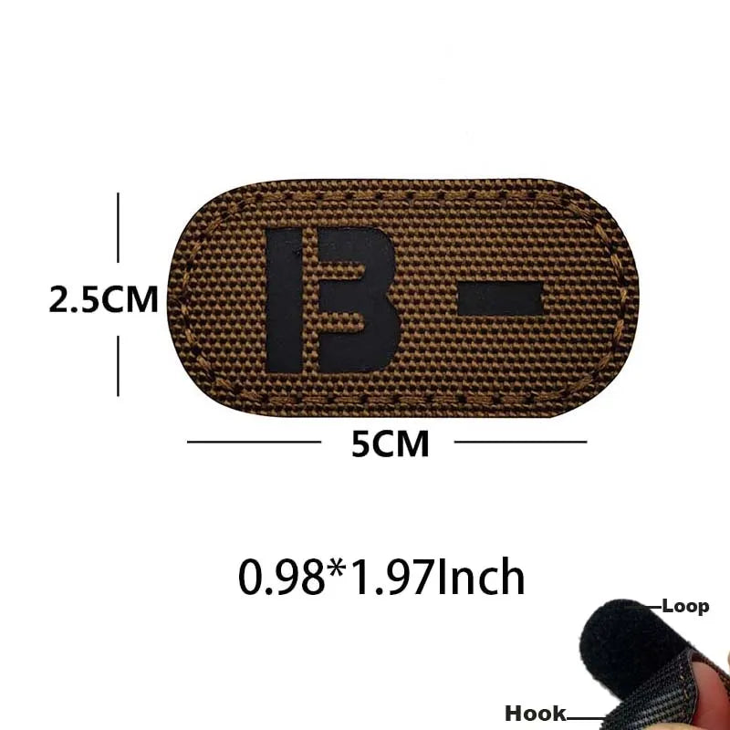 A brown glow-in-the-dark blood type tactical patch with a hook and loop backing.
