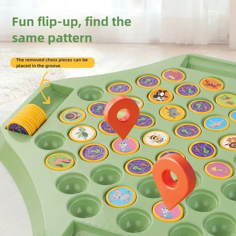 A green flip-up chess board with removable pieces, showing a pattern of colorful animal figures.