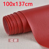 A roll of red PU leather patch measuring 100x137 cm for furniture and craft repairs.