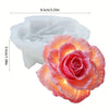 White silicone mold shaped like a rose bloom for chocolate, candy, or fondant