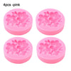 Four pink silicone floral molds for crafting candles, soap, resin, and plaster