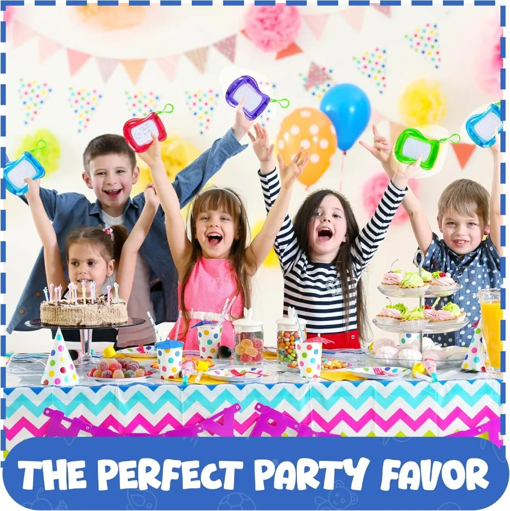 A group of happy children holding colorful magnetic drawing board keychains as party favors.