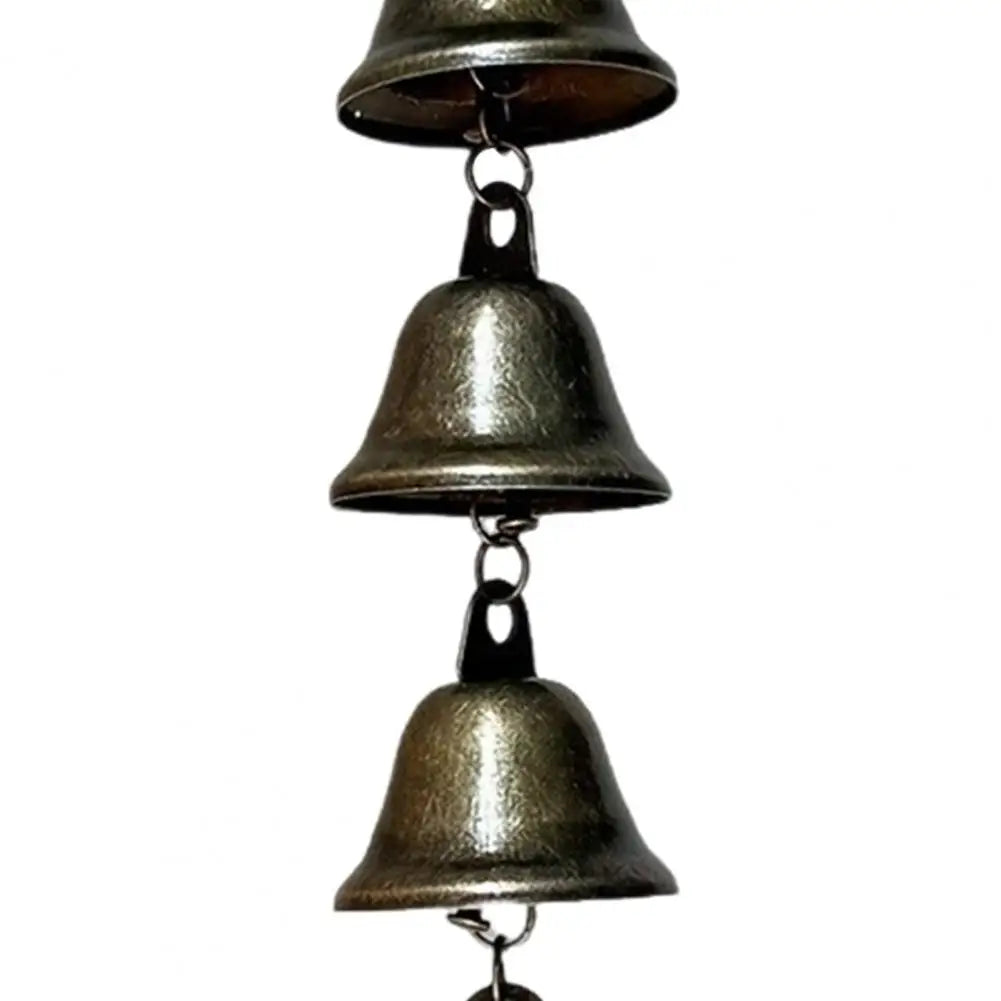 Vintage iron wind chime with multiple hanging bells for outdoor decor