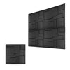 A close-up view of black 3D diamond textured wall panels used as modern accent wall decor.