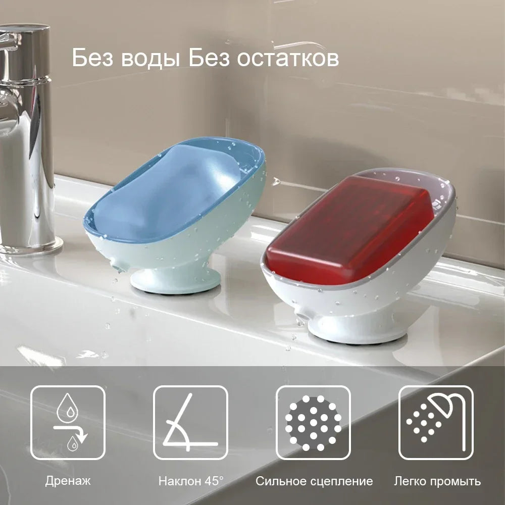 A set of two suction cup soap dishes, one blue and one red, for bathroom or kitchen use.