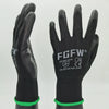A pair of black breathable PU-coated work gloves with green trim shown against a light gray background.