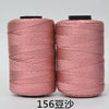 Two spools of pink 3-ply polyester knitting yarn for crochet and hand crafts