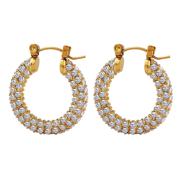 A pair of gold-toned hoop earrings featuring a twisted chain design encrusted with clear crystals.