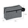 A gray waterproof travel toiletry bag with a black zipper and adjustable strap.