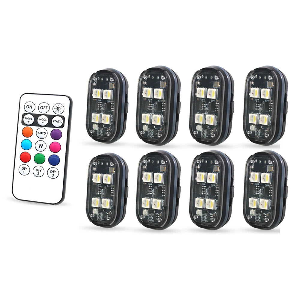 A set of ten multi-color car interior ambient lighting LED strips and a remote control for the system.