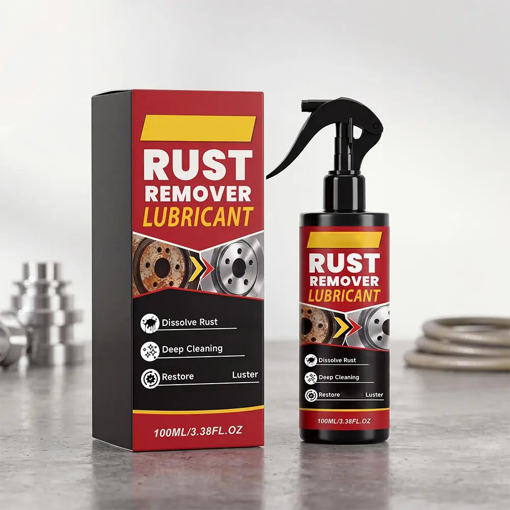 A black box and bottle of Rust Remover Lubricant spray with a black pump dispenser on a gray surface.