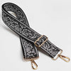Black and white paisley jacquard bag strap with gold hardware