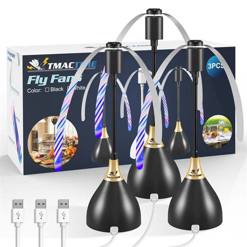 A box and several black portable quiet fly repellent fans with white and purple striped blades are shown.