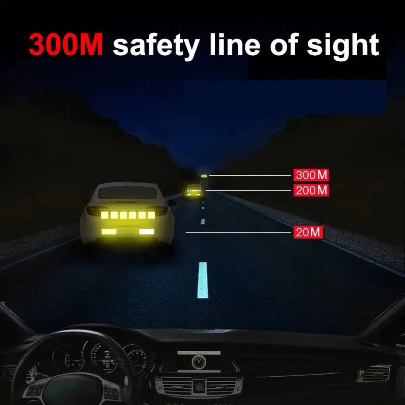 A car driving on a road with safety lines indicating 300M, 200M, and 20M visibility range.