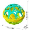 A bright yellow and teal baby sensory spinning rattle toy set with a green base.