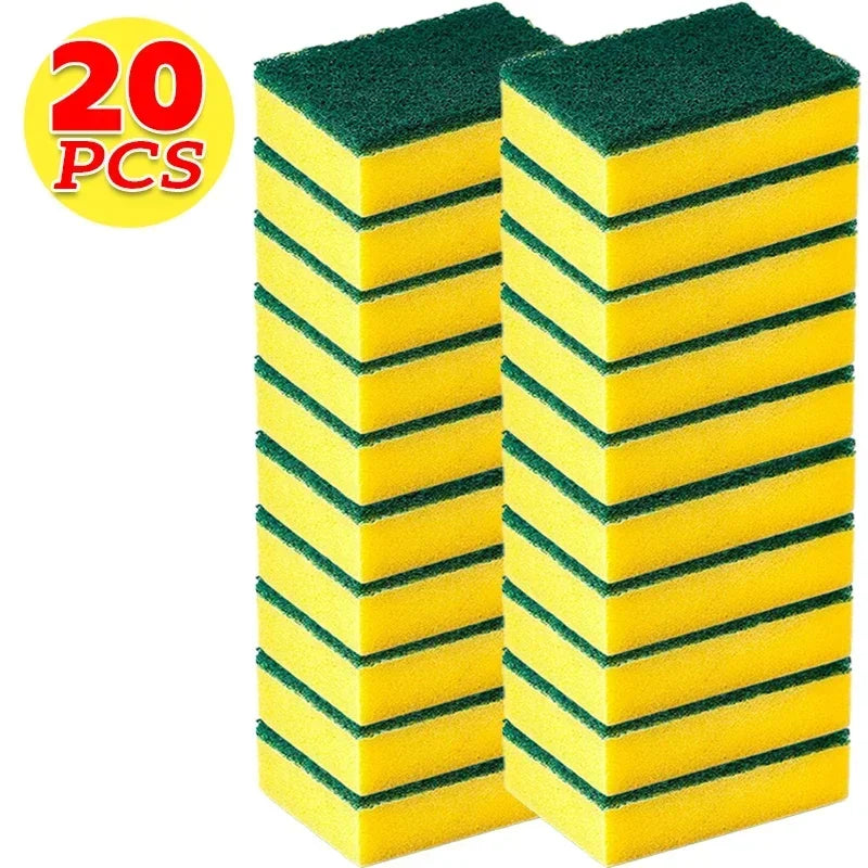 A stack of twenty green and yellow reusable double-sided cleaning sponges.