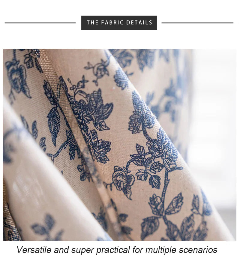 Close-up of a beige cotton-linen curtain fabric featuring a blue retro floral pattern.
