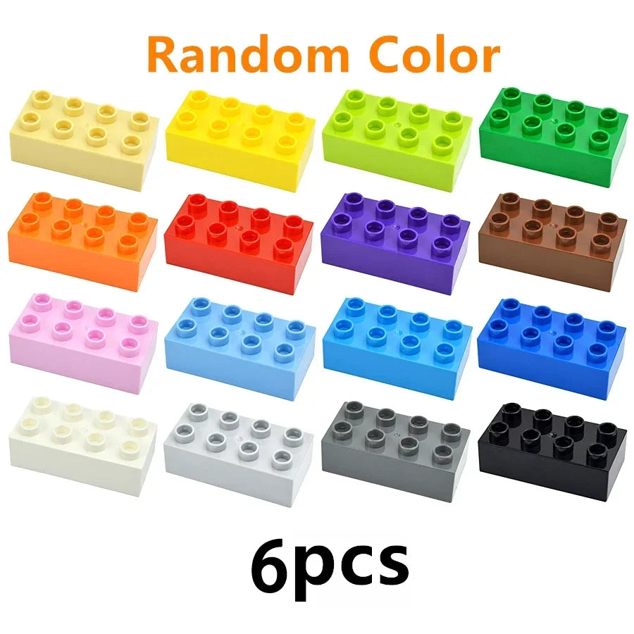 A collection of colorful plastic building blocks in various shades including yellow, green, orange, purple, and blue.