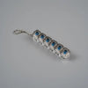 A clear acrylic keychain featuring multiple blue LED mechanical fidget toys.
