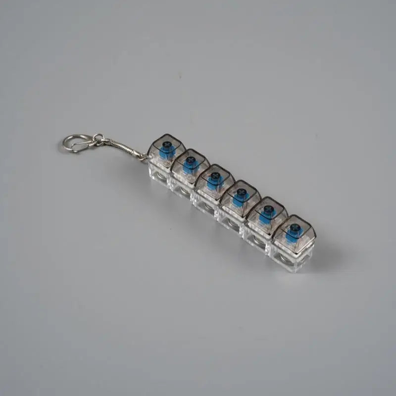 A clear acrylic keychain featuring multiple blue LED mechanical fidget toys.