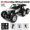 Silver Six-Wheel Alloy Off-Road RC Crawler vehicle with large tires and accessories