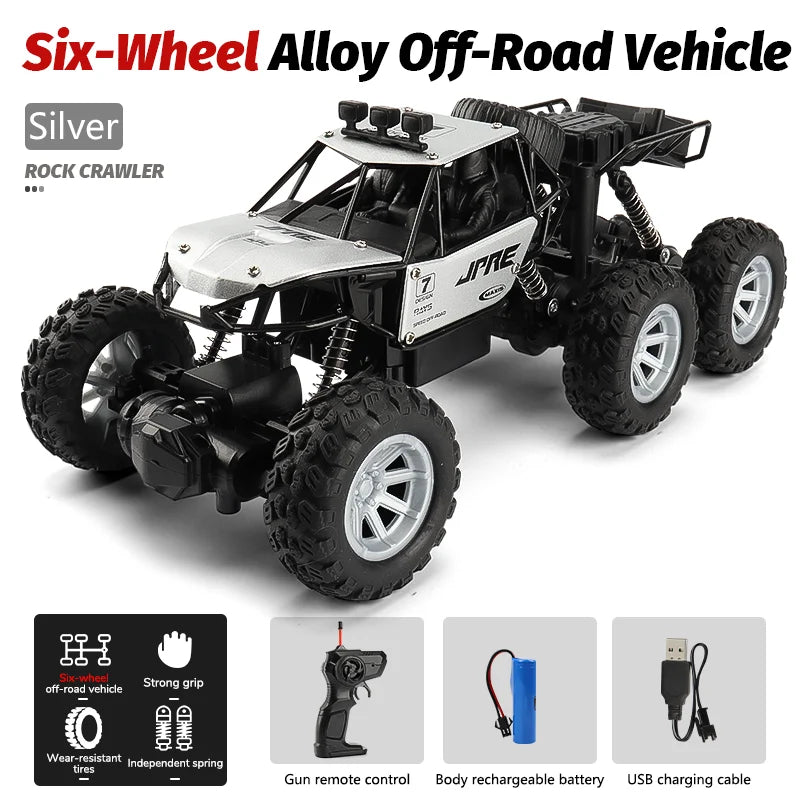 Silver Six-Wheel Alloy Off-Road RC Crawler vehicle with large tires and accessories